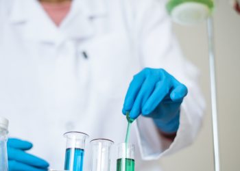 A mand doing experiments in a lab