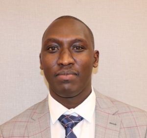 A passport photo of Asaph Kinyanjui jpg